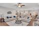 Living room that opens to an eat-in kitchen featuring modern appliances and adjacent to a dining room with seating for four at 174 Vandiver Ct, Acworth, GA 30101