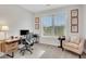 Home office with a desk, computer, and a comfy sitting chair at 174 Vandiver Ct, Acworth, GA 30101