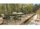 Community playground with multiple slides and picnic area near the clubhouse at 174 Vandiver Ct, Acworth, GA 30101