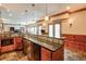 Home bar with custom lighting, dark countertops and stainless steel appliances at 205 Northampton Ct, Canton, GA 30115