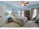 Comfortable bedroom with neutral tones, features plenty of natural light and elegant decor at 205 Northampton Ct, Canton, GA 30115