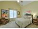 Bedroom with yellow walls, vaulted ceiling and natural light from the window at 205 Northampton Ct, Canton, GA 30115