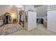 Spacious walk-in closet with ample storage, shelving, and mirrored cabinet at 205 Northampton Ct, Canton, GA 30115