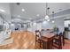 Finished basement with hardwood floors, wet bar, built-in cabinets, and open space at 1207 Promontory Path, Marietta, GA 30062
