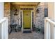 Charming front door with brick facade, decorative plants and elegant lighting at 1207 Promontory Path, Marietta, GA 30062