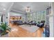 Spacious living room with large windows, hardwood floors, and modern furniture at 1207 Promontory Path, Marietta, GA 30062