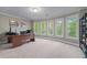 Office with plenty of light, a desk, and an array of windows at 1207 Promontory Path, Marietta, GA 30062