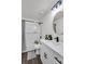 Well-lit bathroom featuring a shower-tub combo and stylish vanity with modern hardware at 2831 Ivanhoe Se Ln, Smyrna, GA 30082