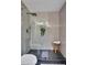 Sleek bathroom shower with patterned tile wall and modern rain shower head at 2831 Ivanhoe Se Ln, Smyrna, GA 30082