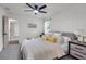 Serene bedroom retreat features a comfortable bed with designer bedding, natural light, and neutral decor for relaxation at 2831 Ivanhoe Se Ln, Smyrna, GA 30082