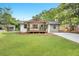 Charming house with a spacious front yard, covered porch, and inviting curb appeal at 2831 Ivanhoe Se Ln, Smyrna, GA 30082