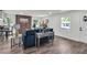 Open floor plan showcases a stylish living area that flows nicely with updated flooring and white paint, perfect for modern living at 2831 Ivanhoe Se Ln, Smyrna, GA 30082