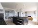 Modern kitchen features sleek island with cooktop, stainless steel appliances, and open concept design at 380 Hillcrest View Dr, Suwanee, GA 30024