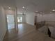 Spacious open loft with hardwood floors, natural light, and a view of the stairway at 380 Hillcrest View Dr, Suwanee, GA 30024