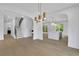 Bright and open layout with staircase, and modern kitchen island at 380 Hillcrest View Dr, Suwanee, GA 30024
