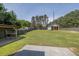 Large, well-maintained backyard with a covered patio, storage shed, and plenty of space for recreation at 1635 Round Rd, Grayson, GA 30017