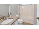 Clean and well-maintained bathroom with a granite vanity, shower, and tile flooring at 1635 Round Rd, Grayson, GA 30017