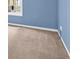 View of bedroom featuring neutral carpet and blue walls at 1635 Round Rd, Grayson, GA 30017