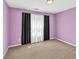 Cozy bedroom featuring soft carpet, large window and neutral wall color at 1635 Round Rd, Grayson, GA 30017