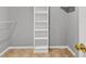 Walk-in closet with built-in shelving at 1635 Round Rd, Grayson, GA 30017