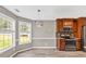 Dining area filled with natural light, and a view of the backyard at 1635 Round Rd, Grayson, GA 30017