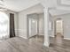 Inviting entryway with beautiful hardwood floors and decorative wainscotting at 1635 Round Rd, Grayson, GA 30017