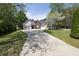 Charming single-Gathering home features a well-manicured lawn and a long driveway at 1635 Round Rd, Grayson, GA 30017