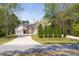 Charming single-story home with manicured lawn, inviting entrance, and long driveway at 1635 Round Rd, Grayson, GA 30017