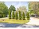 Attractive single-story home with red shutters, green trees and well-maintained lawn at 1635 Round Rd, Grayson, GA 30017
