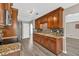 Spacious kitchen features granite countertops, stainless steel appliances, and ample cabinet storage at 1635 Round Rd, Grayson, GA 30017