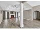 Spacious living room with hardwood floors, fireplace, and decorative trey ceiling at 1635 Round Rd, Grayson, GA 30017
