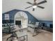 Bright home office with modern desks, a large window, and a ceiling fan at 219 Riverbrook Ct, Mcdonough, GA 30252