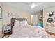Bright bedroom with ceiling fan, unique decorations, and a cozy atmosphere at 380 Amberidge Trl, Atlanta, GA 30328