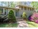 Inviting front entrance with stone pathway, well-maintained landscaping, and freshly painted exterior at 380 Amberidge Trl, Atlanta, GA 30328