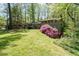 Traditional home with lovely landscaping on a lush, green lot at 380 Amberidge Trl, Atlanta, GA 30328
