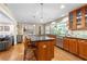 Well-designed kitchen with a large center island, stainless steel appliances, and hardwood flooring at 380 Amberidge Trl, Atlanta, GA 30328