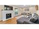 Cozy living room featuring a fireplace, hardwood floors, and comfortable seating at 380 Amberidge Trl, Atlanta, GA 30328