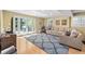 Inviting living room with French doors, large rug, and comfortable seating at 380 Amberidge Trl, Atlanta, GA 30328