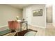 Bright home office featuring a modern desk, stylish chair, and decorative rug at 104 Holcomb Ferry Rd, Roswell, GA 30076