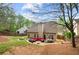 Home with fenced backyard, stone firepit, and outdoor patio seating at 272 William Nye Se Dr, Atlanta, GA 30315