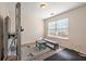 Carpeted home exercise room with workout station, weights, and natural light at 272 William Nye Se Dr, Atlanta, GA 30315