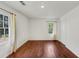 Bedroom featuring bright windows and new hardwood flooring at 856 Glenway Dr, East Point, GA 30344