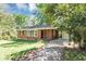 Lovely brick ranch with a front lawn, shade trees and carport at 856 Glenway Dr, East Point, GA 30344
