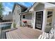 Spacious wooden deck with outdoor seating, grill, and fenced backyard offering a relaxing outdoor experience at 1035 Avalon Dr, Lawrenceville, GA 30044