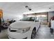 Spacious garage with car parked and additional storage space, offering convenience at 1035 Avalon Dr, Lawrenceville, GA 30044