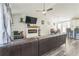 Open-concept living room with a fireplace, hardwood floors, and an open layout at 1035 Avalon Dr, Lawrenceville, GA 30044