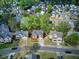 Aerial view of beautiful two-story home with mature trees and landscaping at 4111 Mcever Woods Nw Dr, Acworth, GA 30101