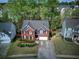 Aerial view of beautiful two-story home with mature trees and landscaping at 4111 Mcever Woods Nw Dr, Acworth, GA 30101