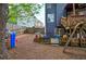 Fenced backyard with a playhouse, swing set, and outdoor play area, ideal for children at 4111 Mcever Woods Nw Dr, Acworth, GA 30101