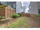 Fenced backyard featuring a patio and garden area with mature trees for added privacy at 4111 Mcever Woods Nw Dr, Acworth, GA 30101